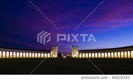Night view of the majestic and imposing columned facade (Barchessa or barn wing) of Villa Manin, the biggest venetian villa of Italy and residence of the last Doge of Venice. Night view of the majestic and imposing columned facade (Barchessa or barn wing) of Villa Manin, the biggest venetian villa of Italy and residence of the last Doge of Venice. 60826583