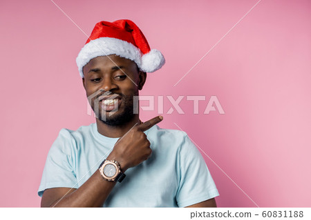 African american man wearing Santa hat 60831188