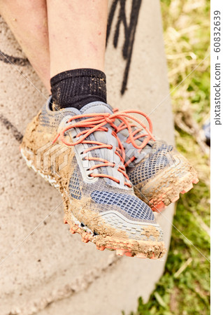 Slippers filled with mud after a Spartan race Slippers filled with mud after a Spartan race 60832639