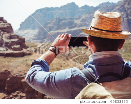 Handsome man, exploring the sights of of Petra Handsome man, exploring the sights of of Petra 60833553