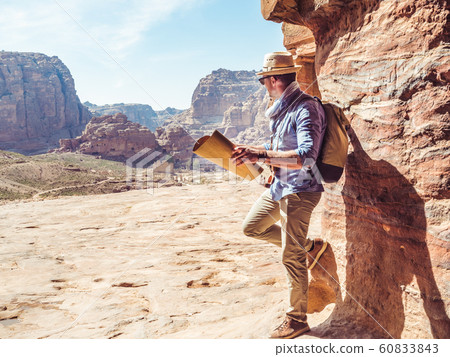 Handsome man, exploring the sights of of Petra Handsome man, exploring the sights of of Petra 60833843