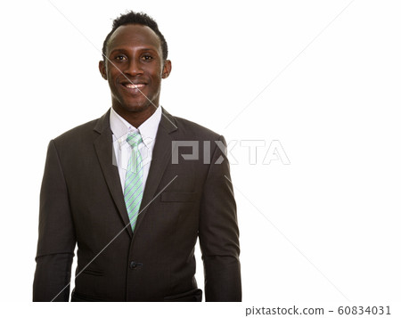 Young happy black African businessman smiling Young happy black African businessman smiling 60834031