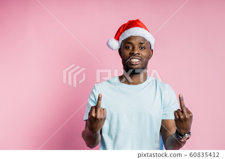African american man wearing Santa hat African american man wearing Santa hat 60835412