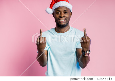 African american man wearing Santa hat African american man wearing Santa hat 60835413