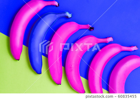 Abstract photo many bananas of blue and pink color 60835455
