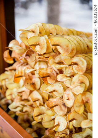 Fried potato chips street food Fried potato chips street food 60835674
