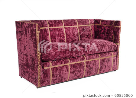 Old red upholstered couch sofa isolated on white Old red upholstered couch sofa isolated on white 60835860