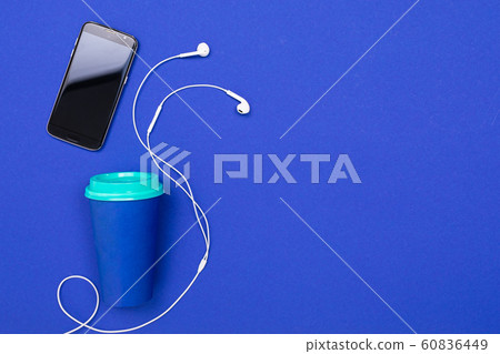 School and office supplies lie neatly on a blue background 60836449