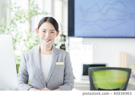 Business woman at work reception 60836963