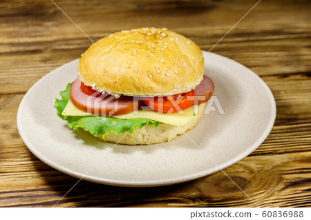 Fresh delicious homemade cheeseburger Fresh delicious homemade cheeseburger 60836988