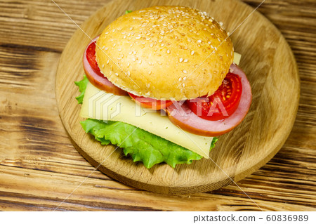 Fresh delicious homemade cheeseburger Fresh delicious homemade cheeseburger 60836989