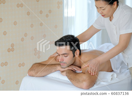 Handsome man enjoy with Thai masseuse massage to Handsome man enjoy with Thai masseuse massage to 60837136
