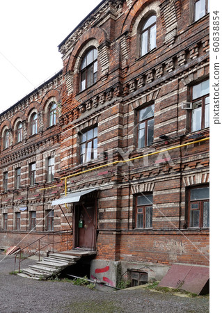Facade of an old brick building in Moscow. Old 60838854
