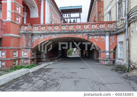 Old stone bridge. Brick arch and tunnel in an old Old stone bridge. Brick arch and tunnel in an old 60838865