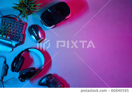 Keyboard, mouse, gamepad, virtual reality headset and headphones. Keyboard, mouse, gamepad, virtual reality headset and headphones. 60840585