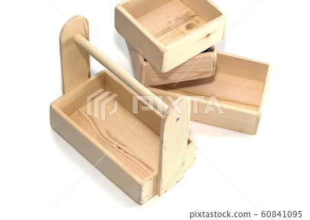 Empty wooden box. Made of pine, on a light white 60841095