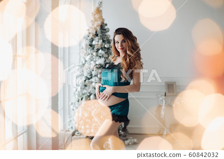 Beautiful fashion pregnancy young girl in pajamas Beautiful fashion pregnancy young girl in pajamas 60842032