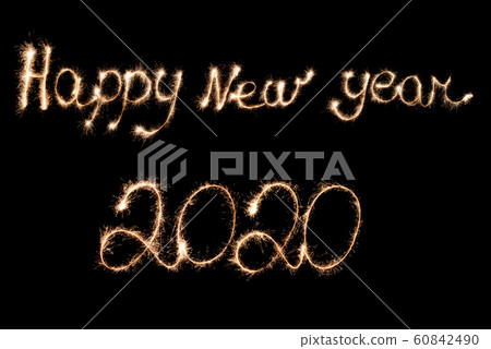Happy New Year 2020 inscription with sparklers . Happy New Year 2020 inscription with sparklers . 60842490