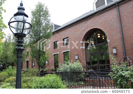 Brick building and streetlight Brick building and streetlight 60848573