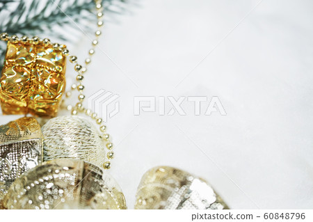 Christmas ornament balls, pox, bell, fir branches. White copy space on the right. Christmas ornament balls, pox, bell, fir branches. White copy space on the right. 60848796