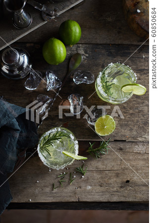 lemonade in glass with rosemary. . 60850684