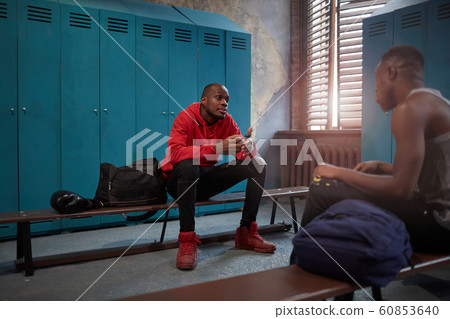 Sportsmen resting after training Sportsmen resting after training 60853640