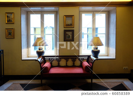 Red two-seat sofa with two bay windows and two lamps 60858389