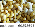 Yellow cocoon Natural products, silk cocoon texture background 60858693