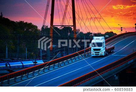 truck with container rides over the bridge, 60859883