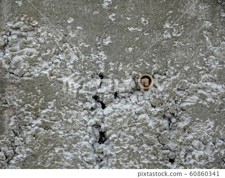New fresh concrete surface with honeycomb problem and exposing reinforcement bar inside. The problem weakens the concrete strength. . New fresh concrete surface with honeycomb problem and exposing reinforcement bar inside. The problem weakens the concrete strength. . 60860341