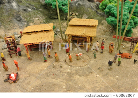 KUALA LUMPUR, MALAYSIA -NOVEMBER 26, 2017: Miniature model of fisherman village. The model shows villagers daily activity.  60862807