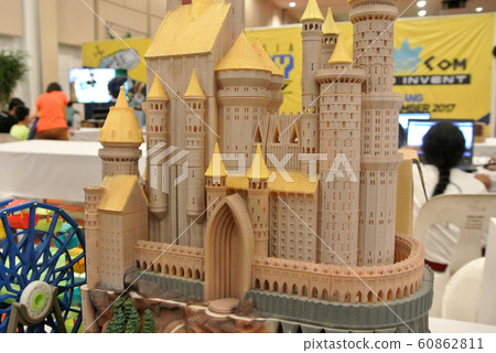 KUALA LUMPUR, MALAYSIA -NOVEMBER 26, 2017: The Miniature model of a medieval stone castle. KUALA LUMPUR, MALAYSIA -NOVEMBER 26, 2017: The Miniature model of a medieval stone castle. 60862811