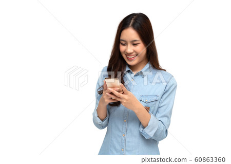 Cheerful young Asian woman using smartphone Cheerful young Asian woman using smartphone 60863360