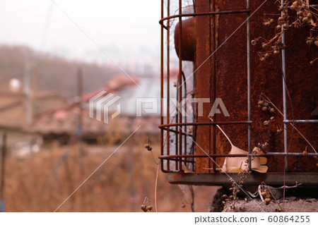 Rusty chimney fuel can 60864255