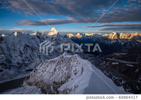 Himalaya at Sunrise. View from Top of Island Peak Mountain. Nepal Himalaya at Sunrise. View from Top of Island Peak Mountain. Nepal 60864317
