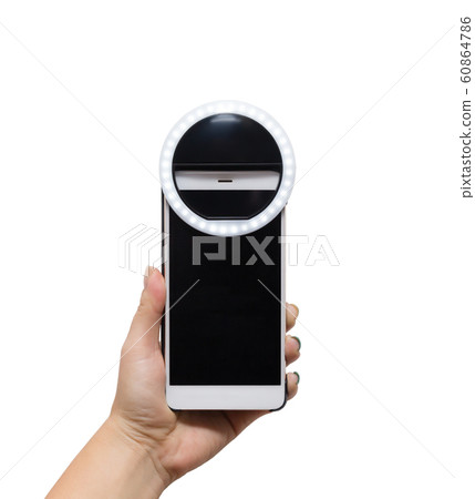hand holding smarthone with selfie ring lamp hand holding smarthone with selfie ring lamp 60864786