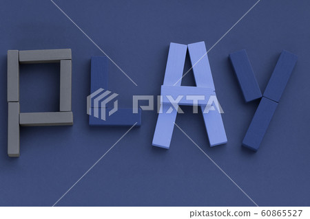 Word PLAY made from wooden bricks on blue Word PLAY made from wooden bricks on blue 60865527