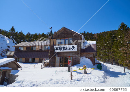 Near the mountain hut at Kita-Yatsugatake Kita-Yokodake in winter 60867763