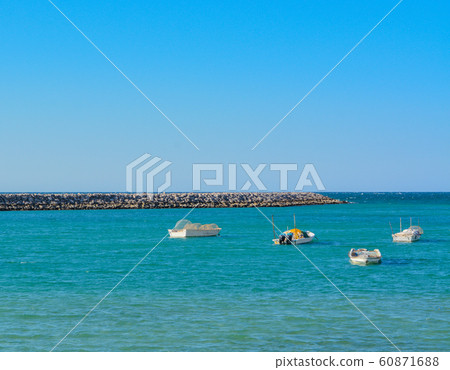 Fishing boats in a cove on the Persian Gulf. United Arab Emirates 60871688