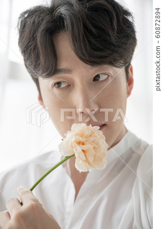 Man beauty white flower Man beauty white flower 60872894