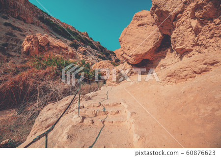 Hiking path in the nature reserve Ein Gedi, Israel. Oasis in the desert 60876623