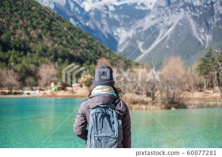 Young woman traveler traveling at Blue Moon 60877281
