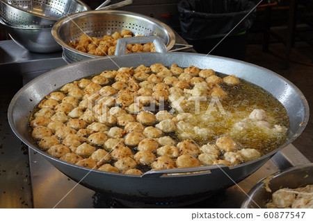 Fried shrimp balls in hot oil the pan. street food Fried shrimp balls in hot oil the pan. street food 60877547