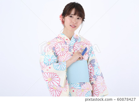 A woman in a yukata A woman in a yukata 60878427