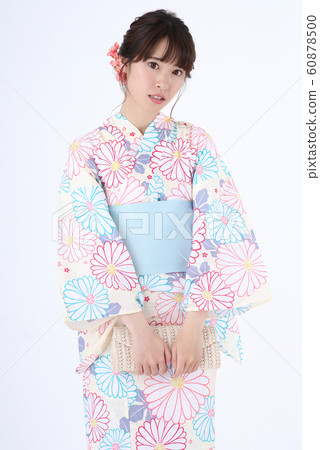 A woman in a yukata A woman in a yukata 60878500