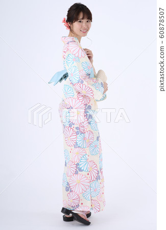 A woman in a yukata A woman in a yukata 60878507