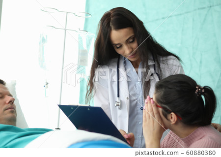 Worker in uniform and stethoscope 60880380
