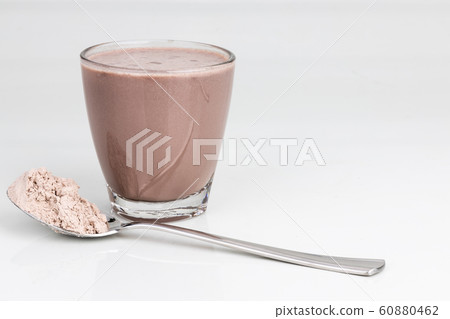 Chocoate flavored protein drinks in glass with Chocoate flavored protein drinks in glass with 60880462
