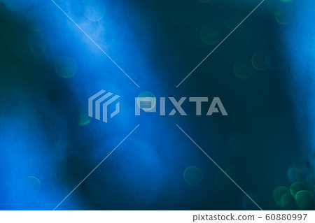 Beautiful bokeh on a sea blue background. Beautiful bokeh on a sea blue background. 60880997