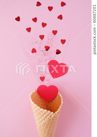 Waffle cone with valentine element on pink background. Holiday concept. 60887201